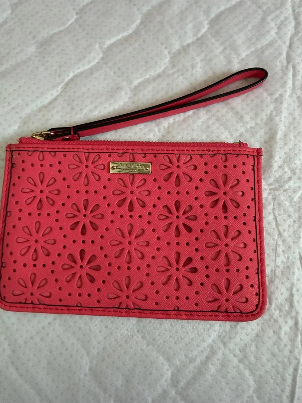 kate spade Coral Pink Floral Laser-Cut Wristlet with Gold Hardware